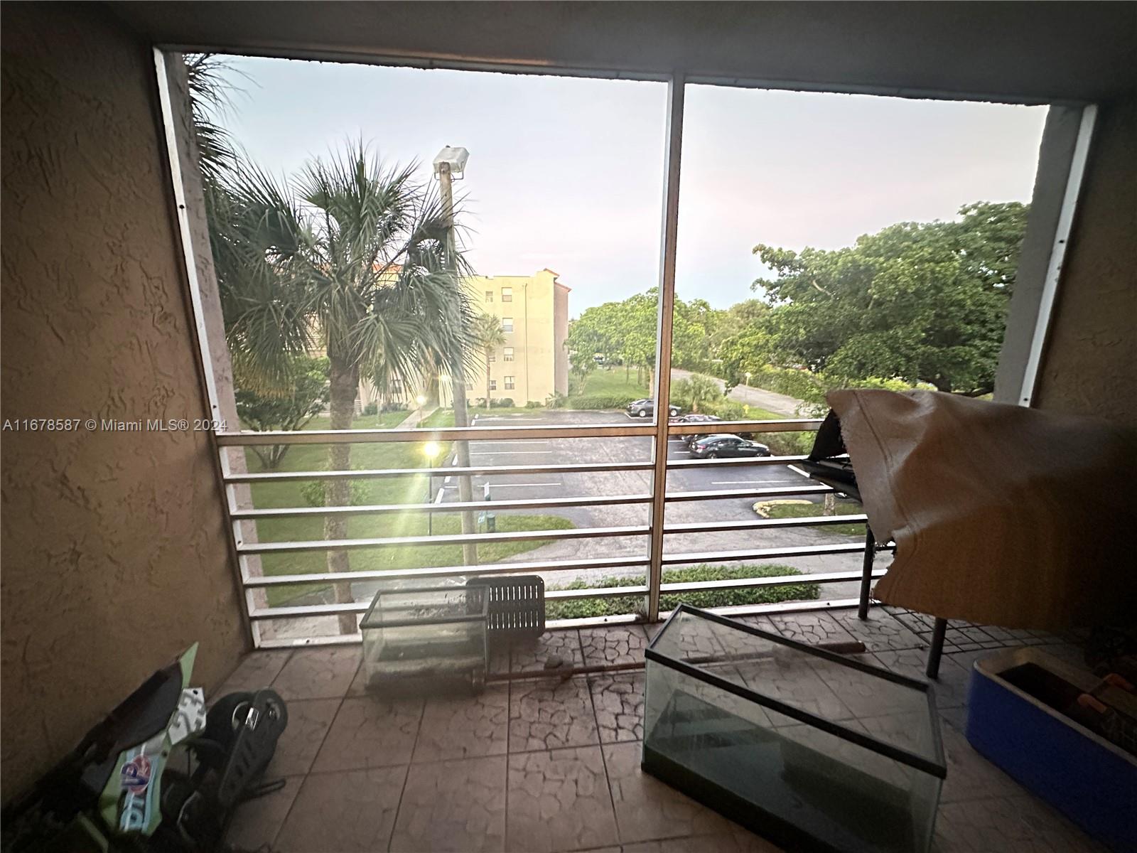 1820 Southwest 81st Avenue, Unit 3308 North Lauderdale, FL 33068 - Photo 13 of 49 a view of a room with furniture and a window