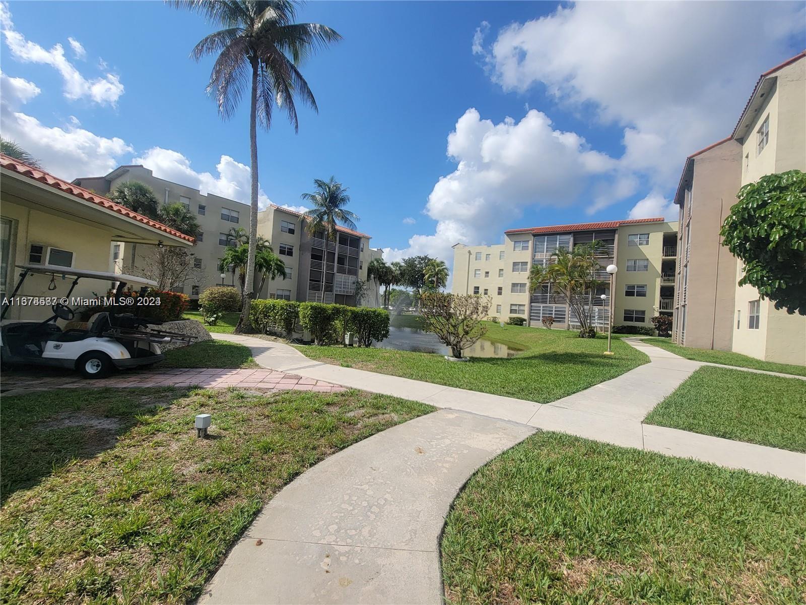 1820 Southwest 81st Avenue, Unit 3308 North Lauderdale, FL 33068 - Photo 47 of 49 a view of a street with a building in the background