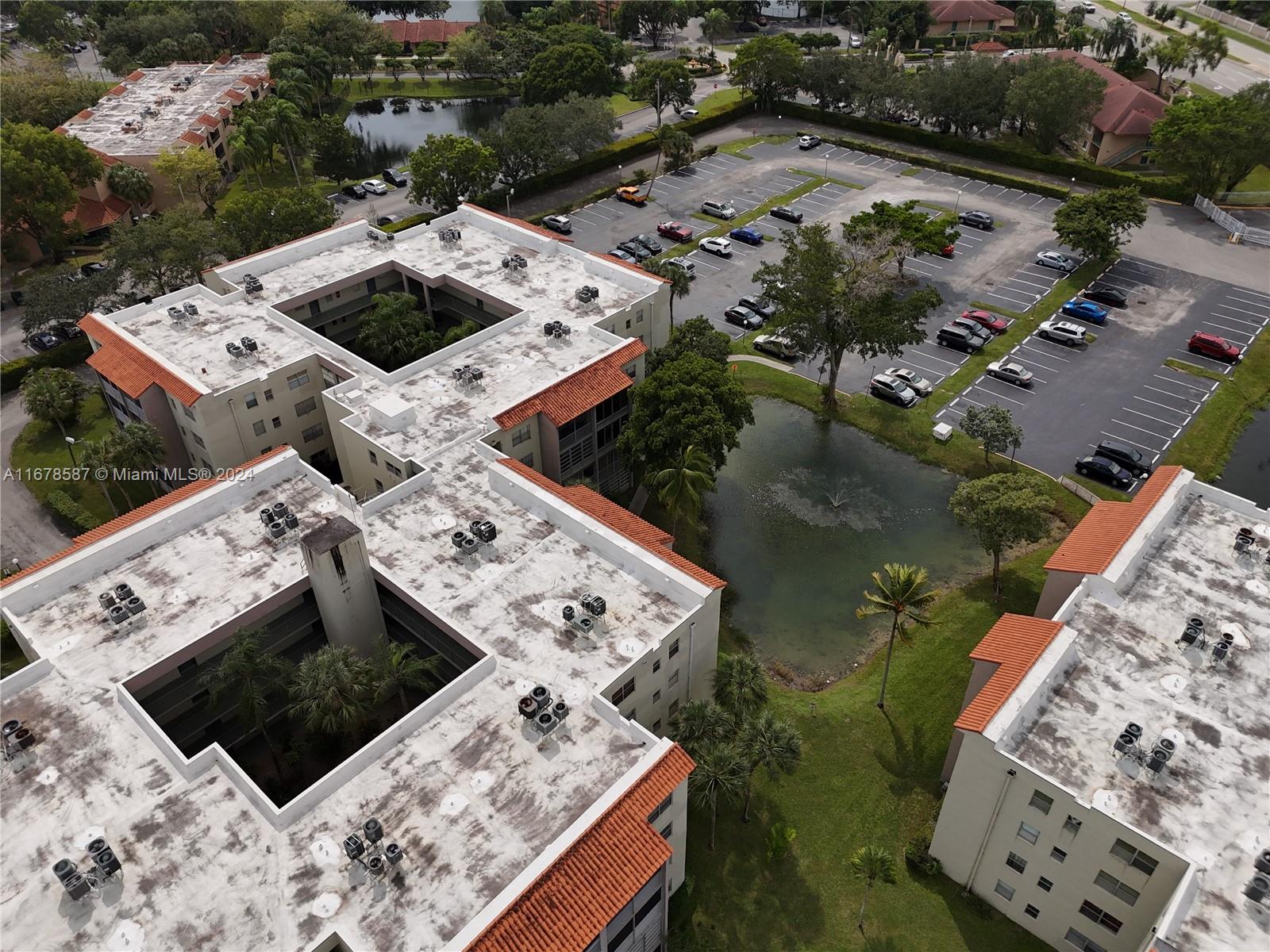 1820 Southwest 81st Avenue, Unit 3308 North Lauderdale, FL 33068 - Photo 6 of 49 an aerial view of a house with outdoor space