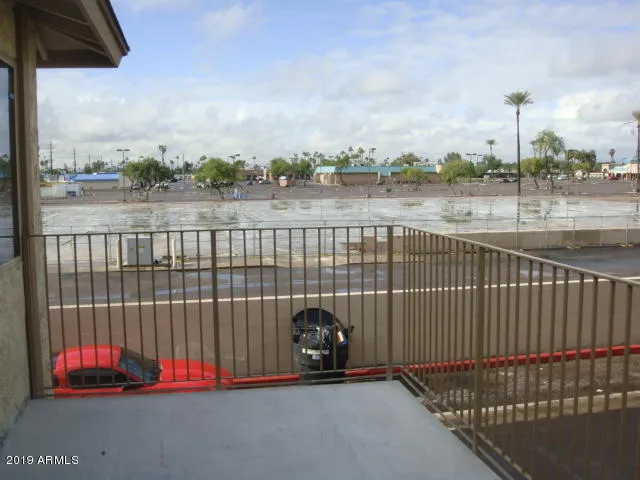 a kitchen with granite countertop cabinets and window