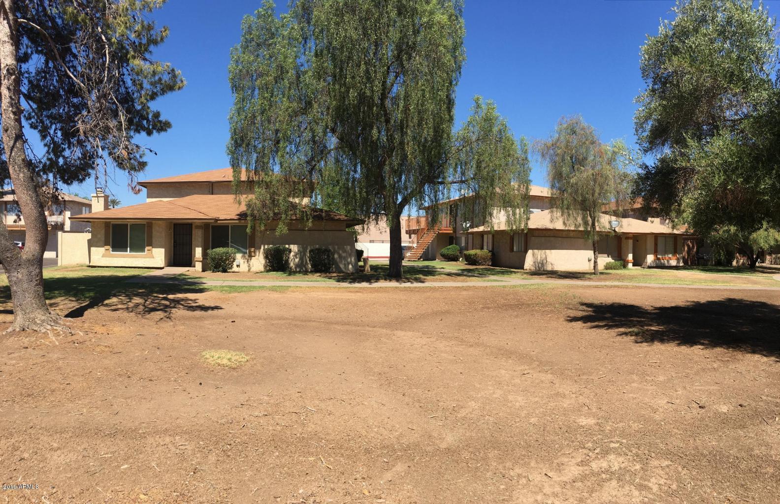 3315 West Loma Lane, Unit 4 Phoenix, AZ 85051 - Photo 5 of 13 a view of city street with a building