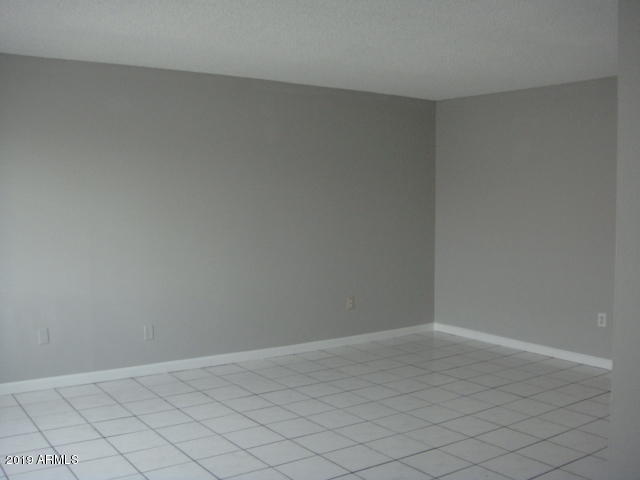 3315 West Loma Lane, Unit 4 Phoenix, AZ 85051 - Photo 6 of 13 a view of an empty room