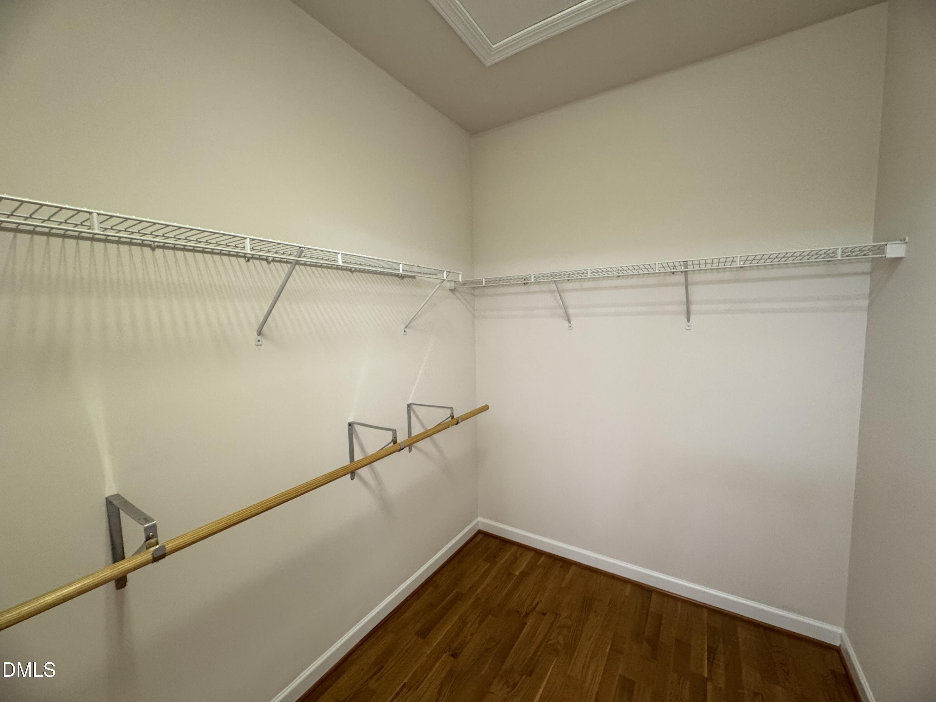 4622 Ivy Blossom Lane Raleigh, NC 27604 - Photo 11 of 15 a view of a room with racks on the wall