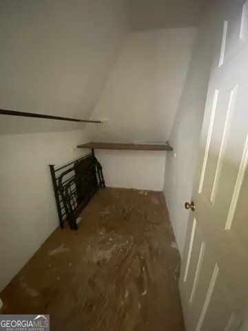 a view of a porch with wooden floor