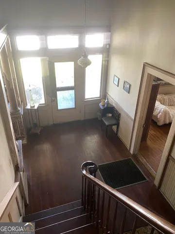 a kitchen with a sink a stove and a refrigerator