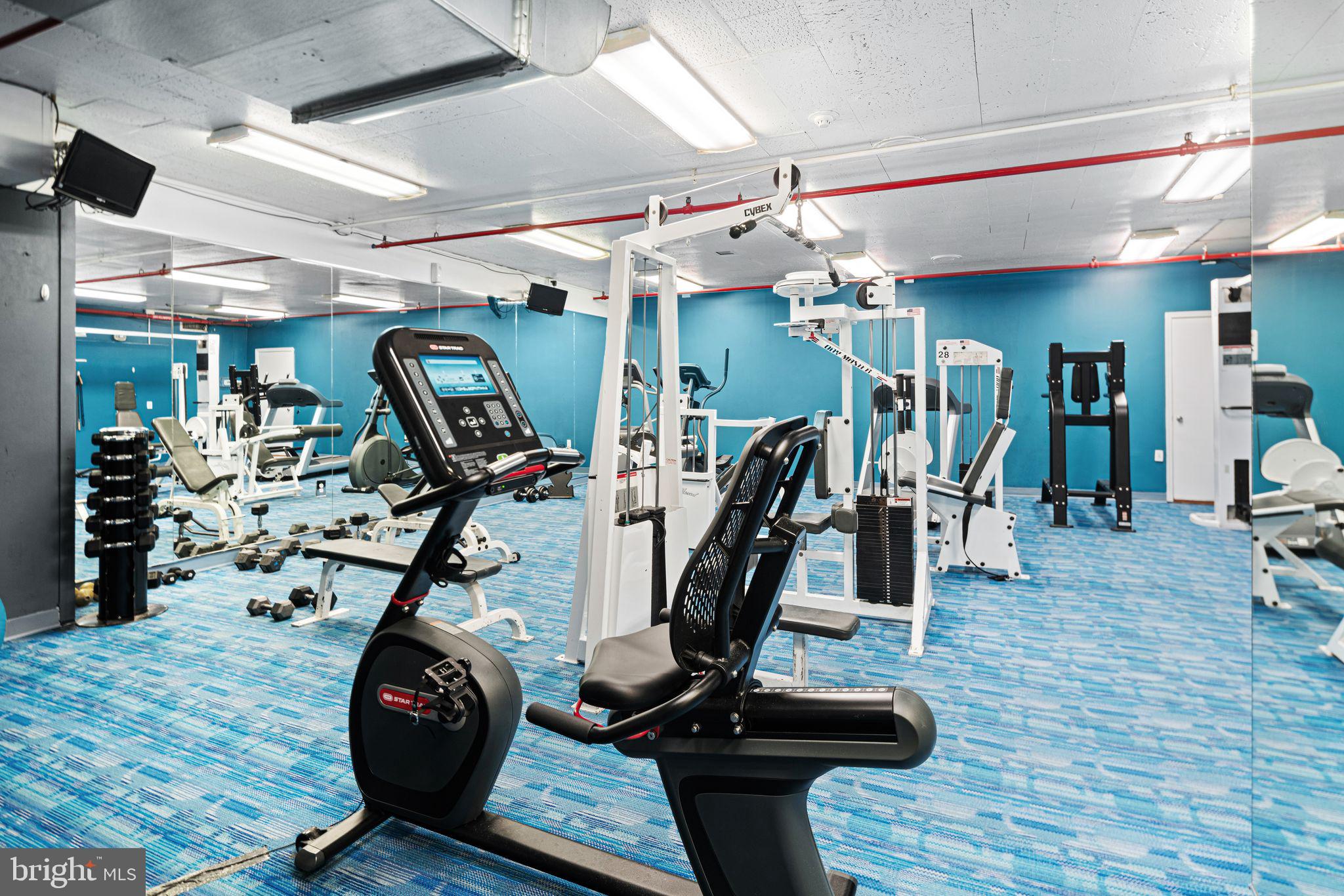 1324 Locust Street, Unit 717 Philadelphia, PA 19107 - Photo 9 of 12 a view of a room with gym equipment