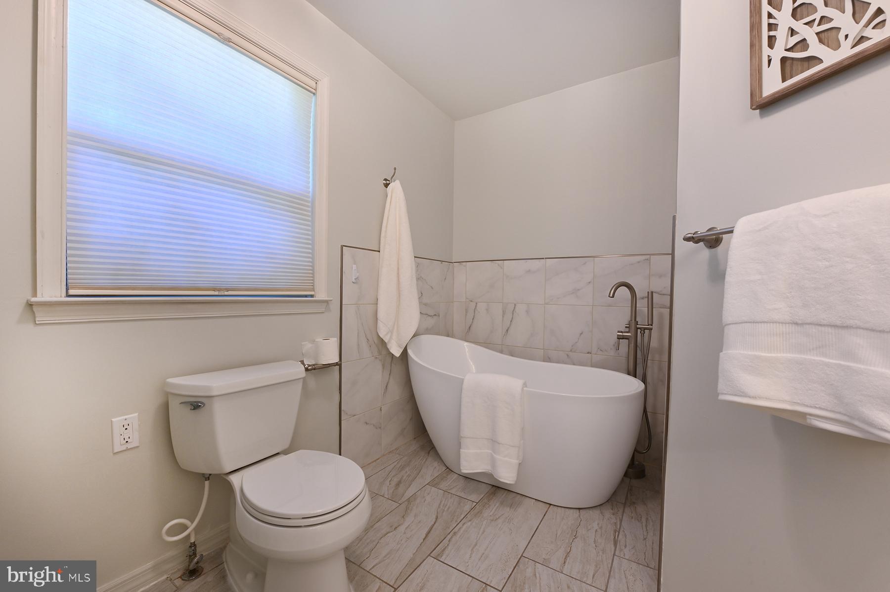 4119 Waterview Drive Edgewater, MD 21037 - Photo 13 of 34 Freestanding bathtub in primary bathroom