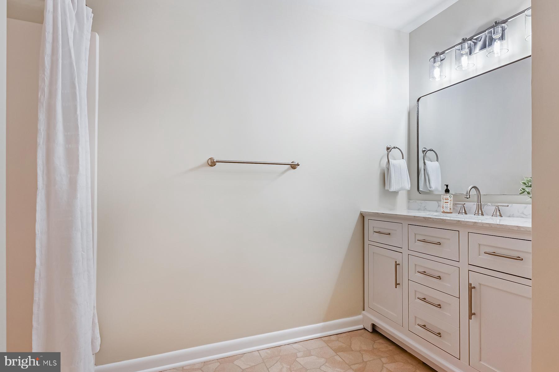 4119 Waterview Drive Edgewater, MD 21037 - Photo 23 of 34 Sleek marble vanity and walk-in shower