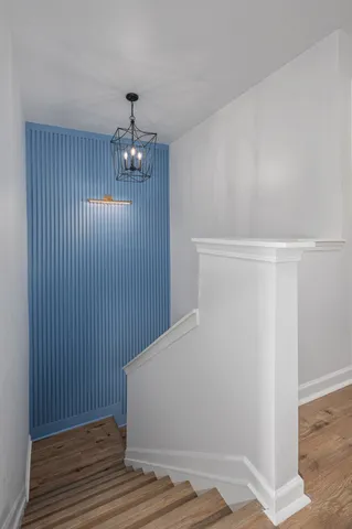 a view of a livingroom with wooden floor
