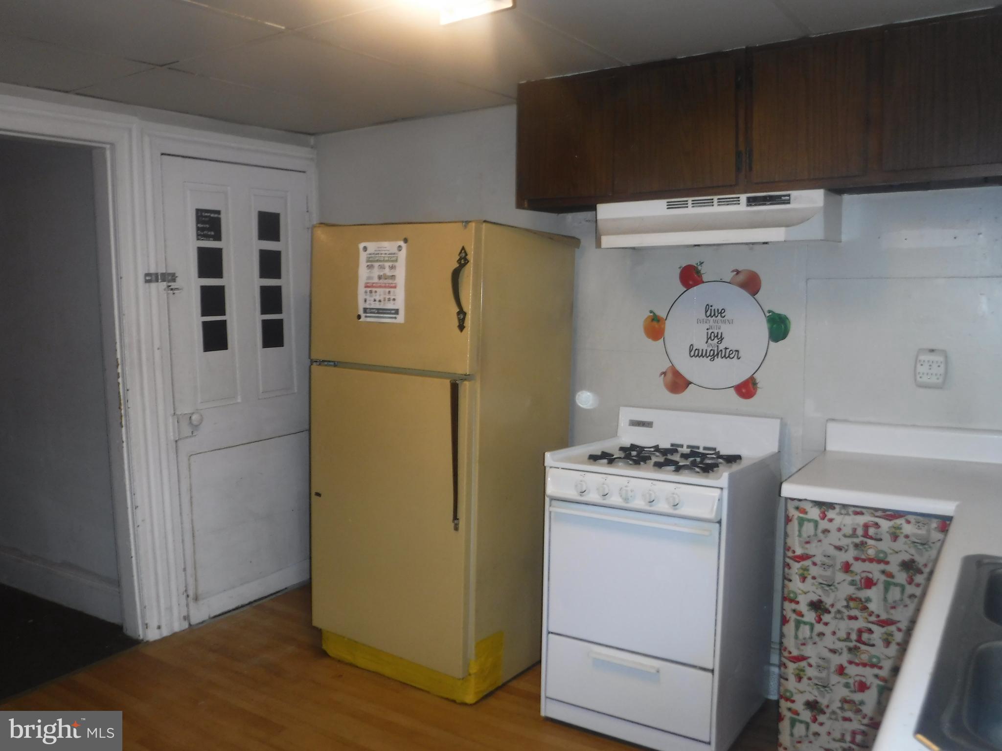 126 A North Dover, DE 19904 - Photo 5 of 6 a utility room with fridge dryer and washer