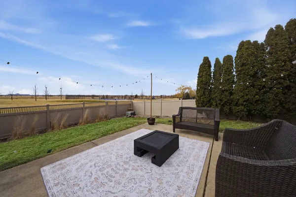 a view of a terrace with chairs