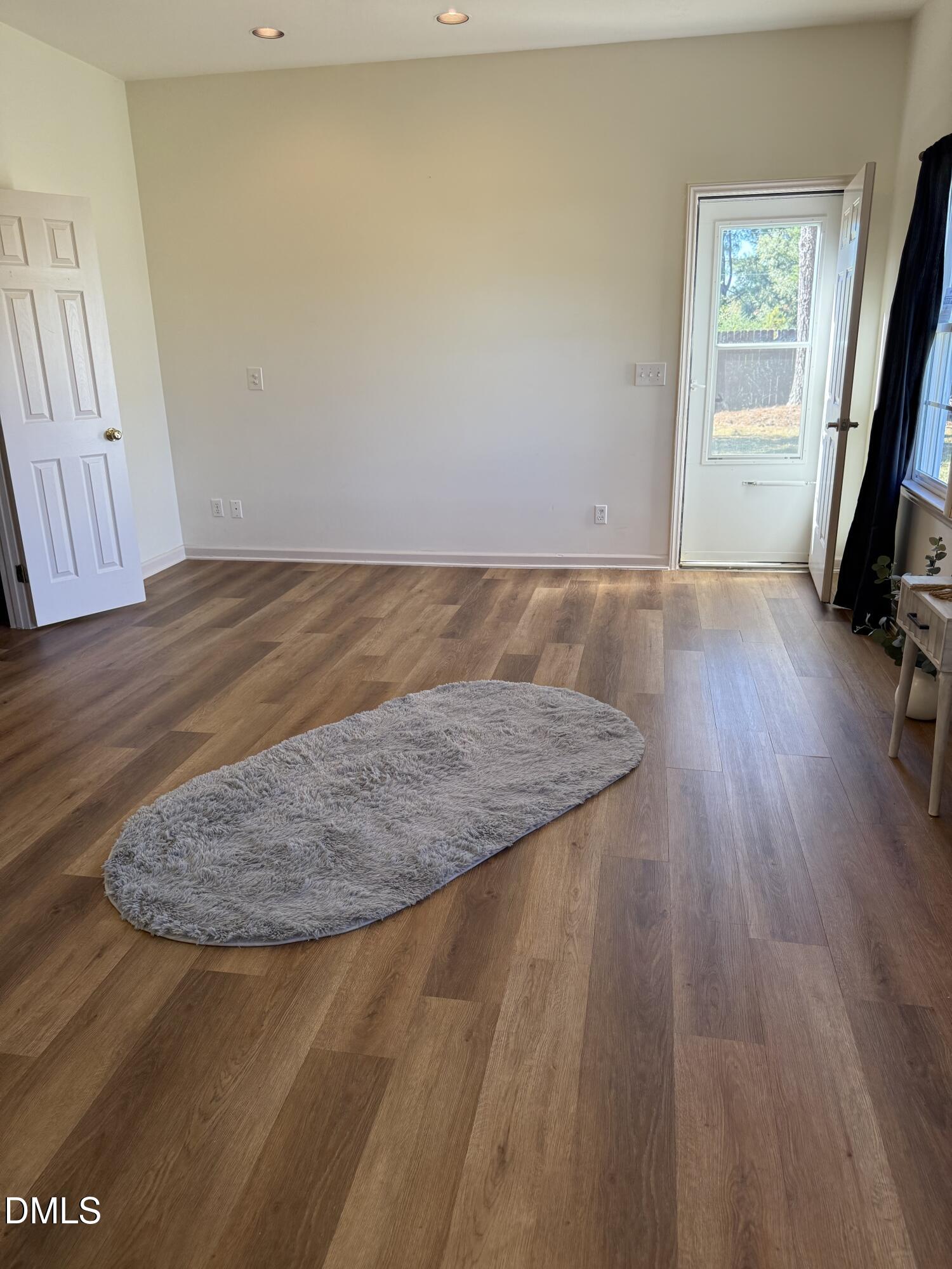 404 West A Street Erwin, NC 28339 - Photo 32 of 44 a view of a room with wooden floor and a window