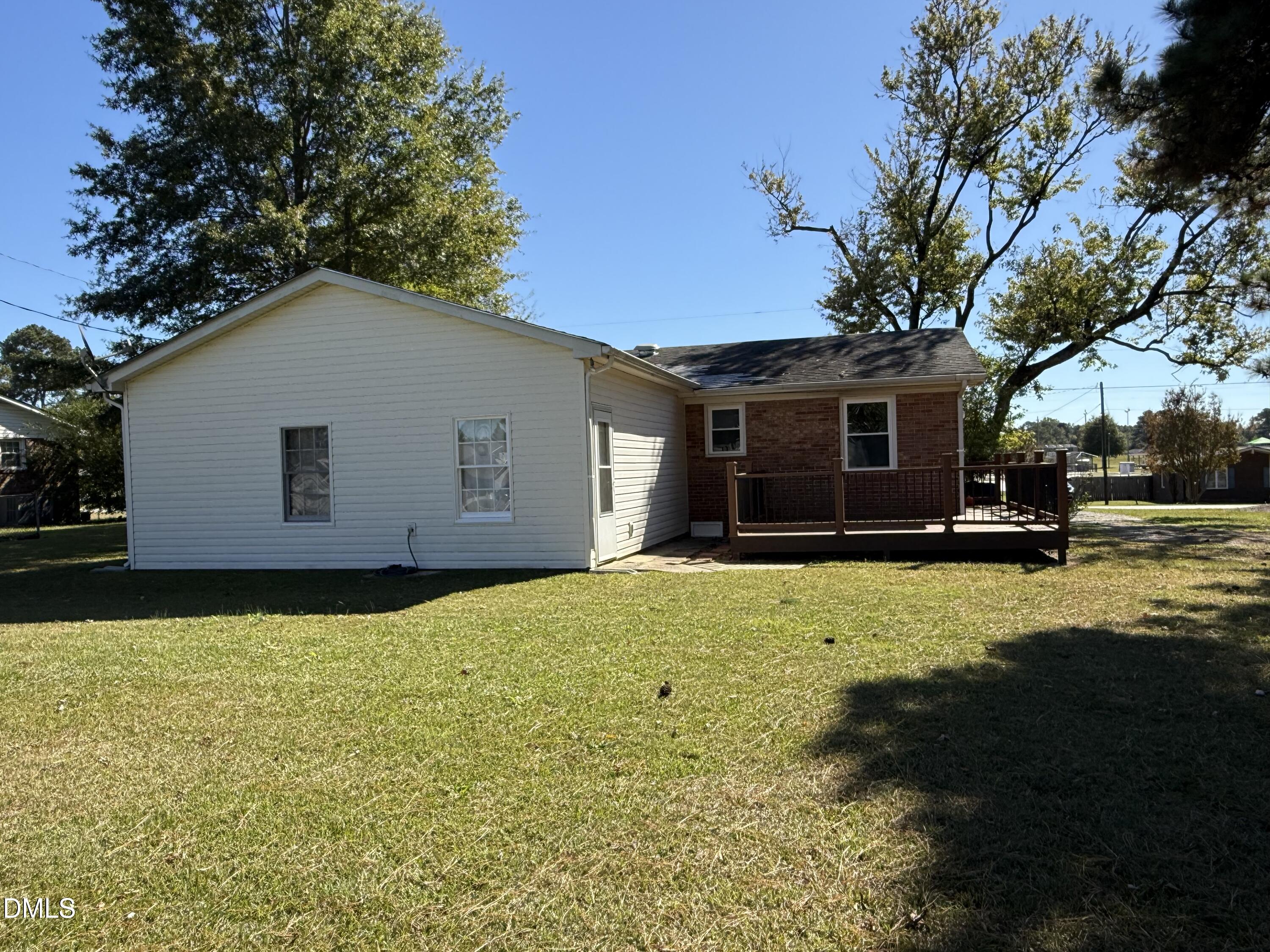 404 West A Street Erwin, NC 28339 - Photo 7 of 44 a house view with a garden space