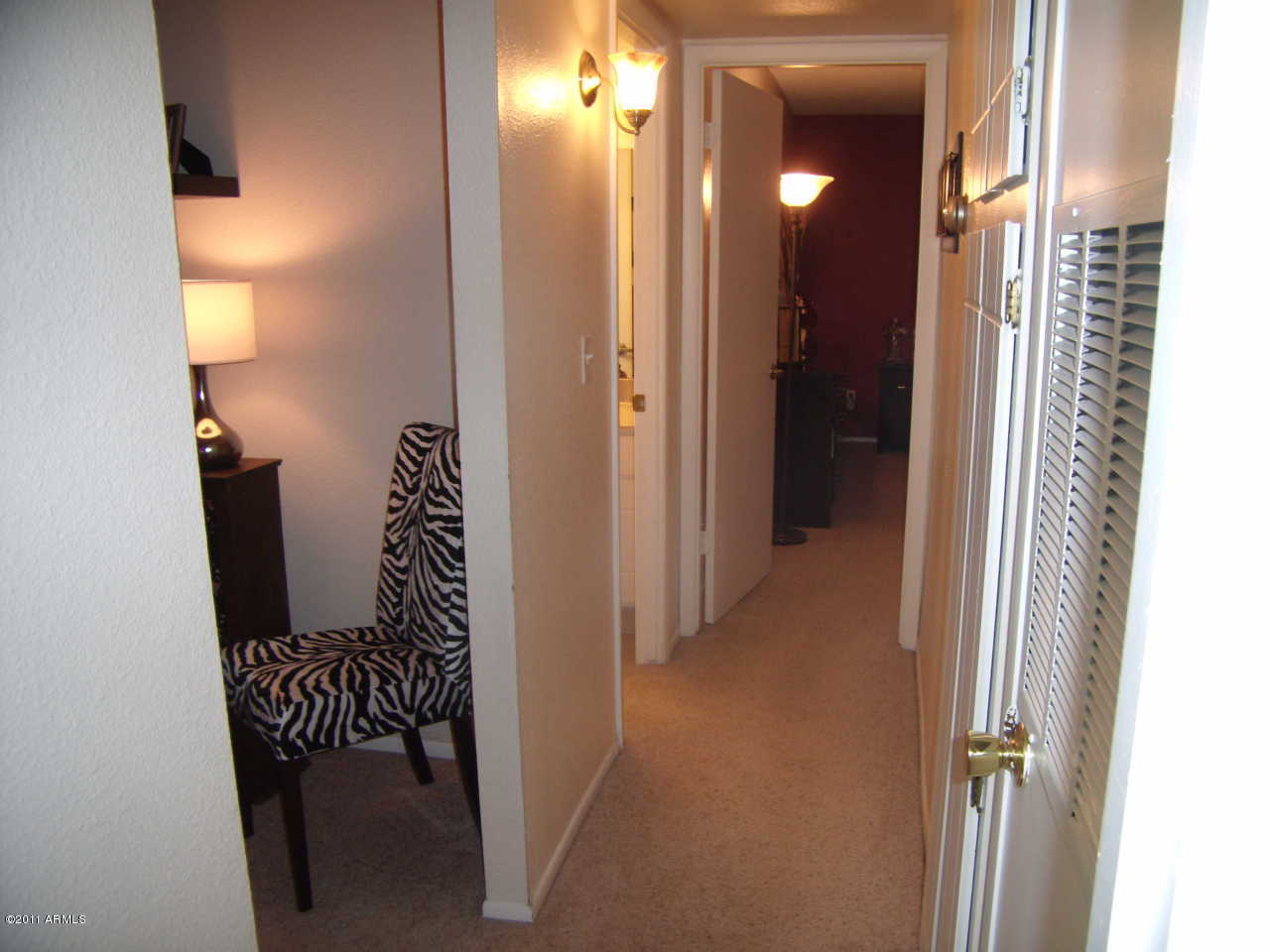 4201 East Camelback Road, Unit 19 Phoenix, AZ 85018 - Photo 17 of 27 Hall to Master Bedroom