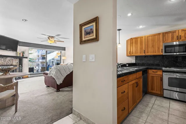 a kitchen with granite countertop lots of counter top space
