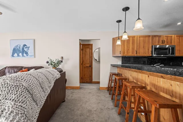 a bed room with a bed and a television