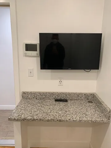 a view of a utility room with a door