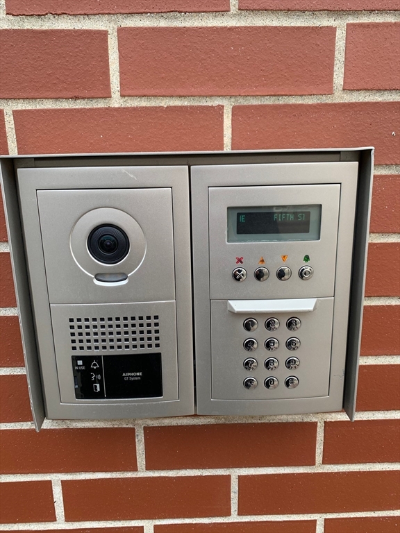 16 5th Street, Unit 31 Chelsea, MA 02150 - Photo 24 of 25 a view of a fireplace in a kitchen