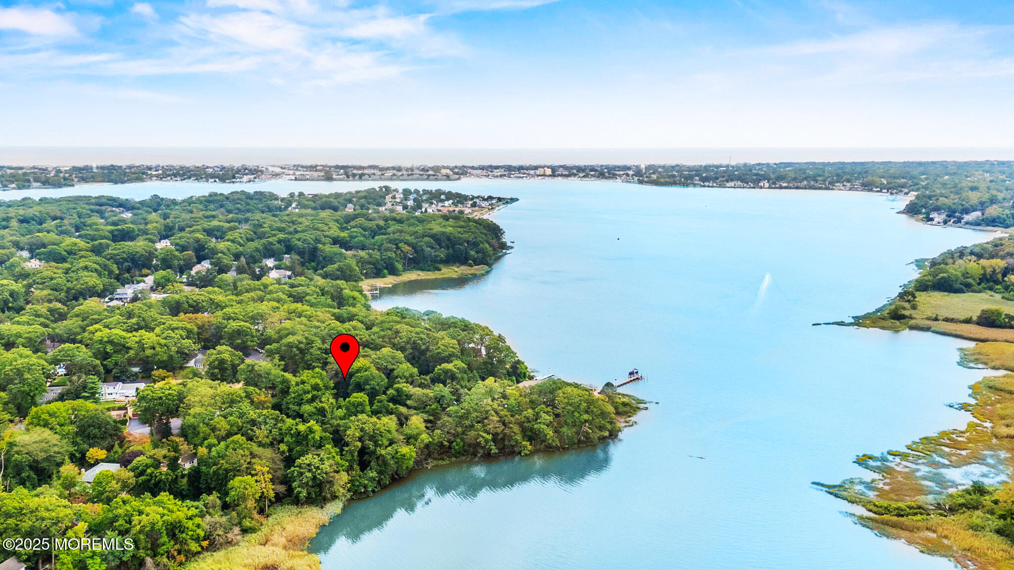 a view of a lake with a city