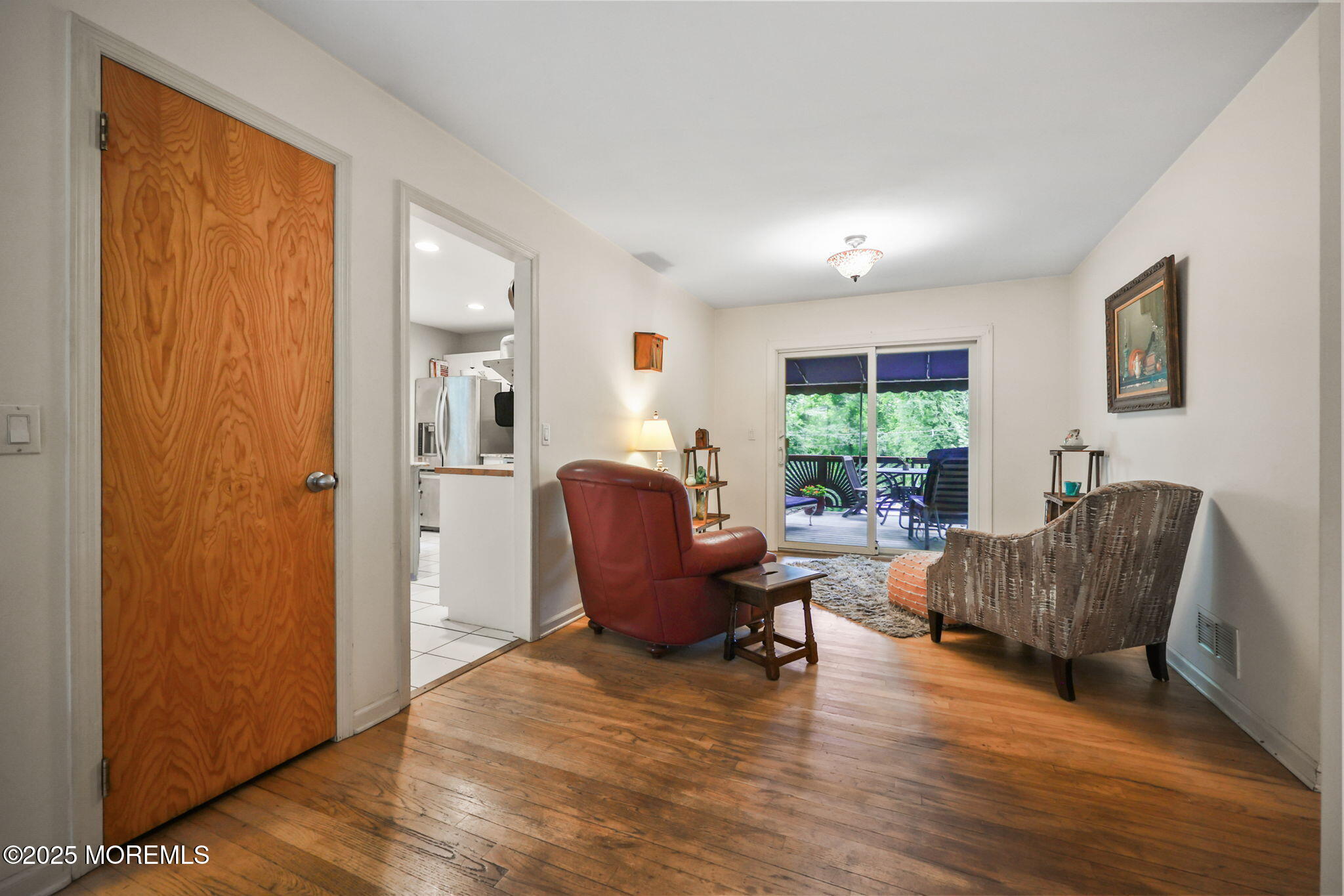 724 South Riverside Drive Neptune Township, NJ 07753 - Photo 14 of 39 a living room with furniture and a window