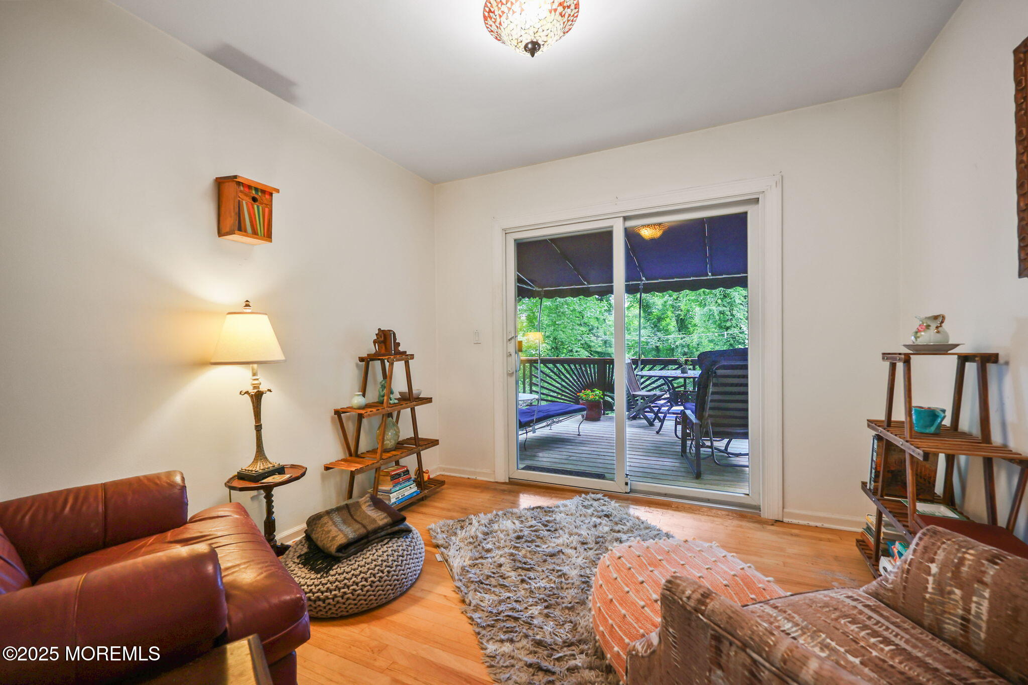724 South Riverside Drive Neptune Township, NJ 07753 - Photo 15 of 39 a living room with furniture and a window