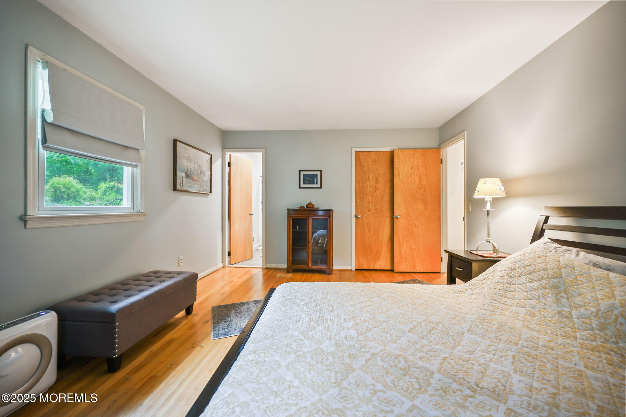 724 South Riverside Drive Neptune Township, NJ 07753 - Photo 17 of 39 a bed room with a bed and a window