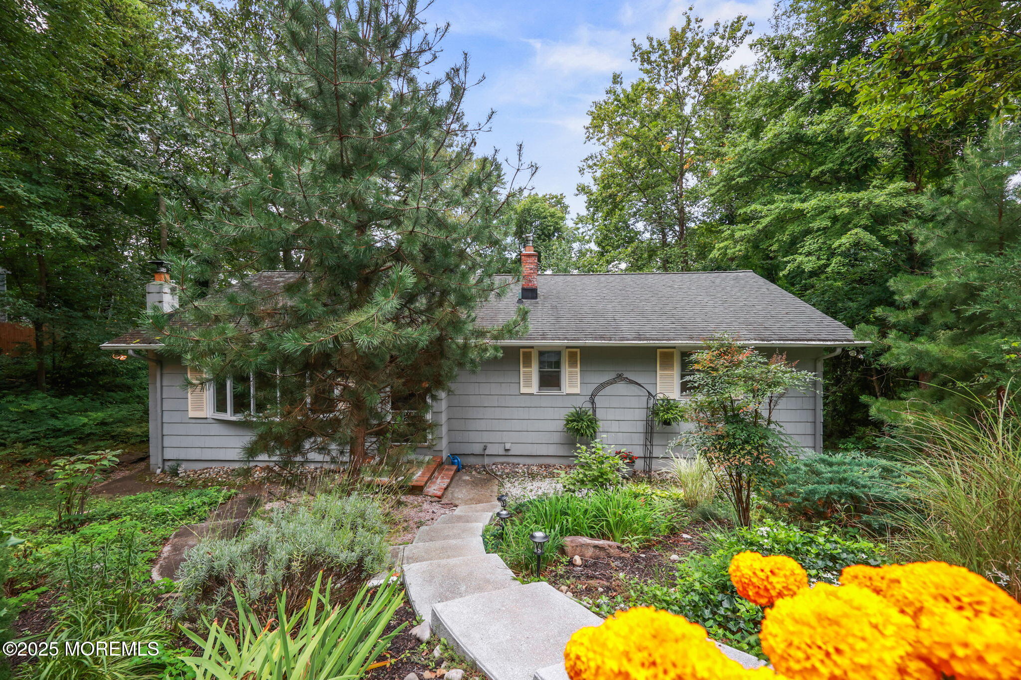 724 South Riverside Drive Neptune Township, NJ 07753 - Photo 2 of 39 a front view of a house with garden
