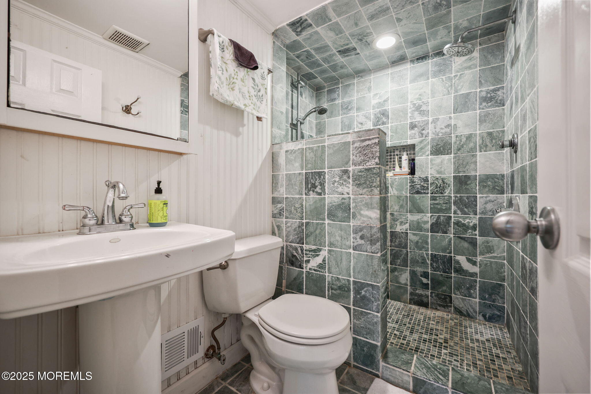 724 South Riverside Drive Neptune Township, NJ 07753 - Photo 27 of 39 a bathroom with a sink toilet and shower