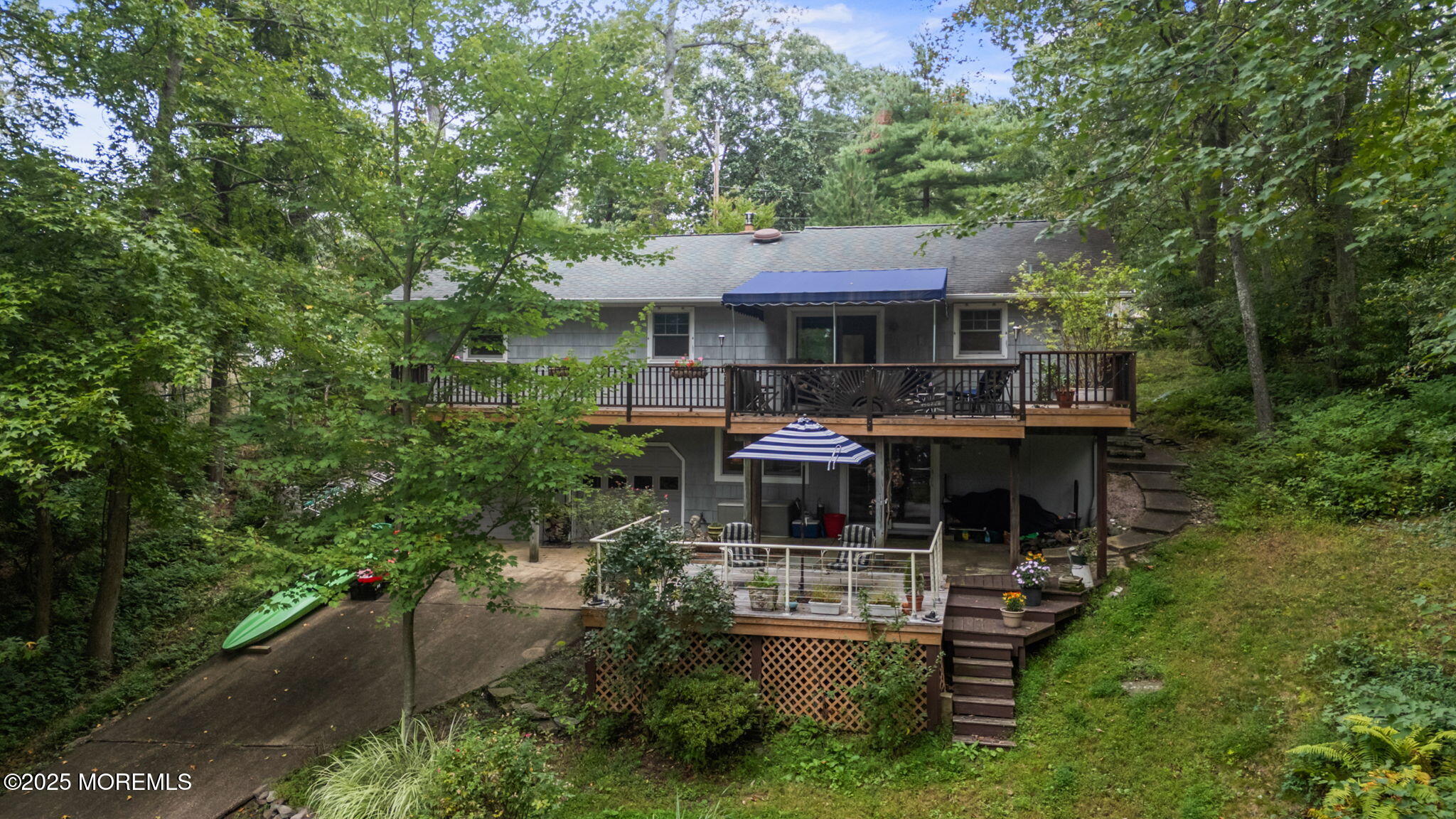 724 South Riverside Drive Neptune Township, NJ 07753 - Photo 39 of 39 a patio with sofas fire pit table and chairs