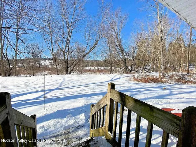 a view of street from balcony