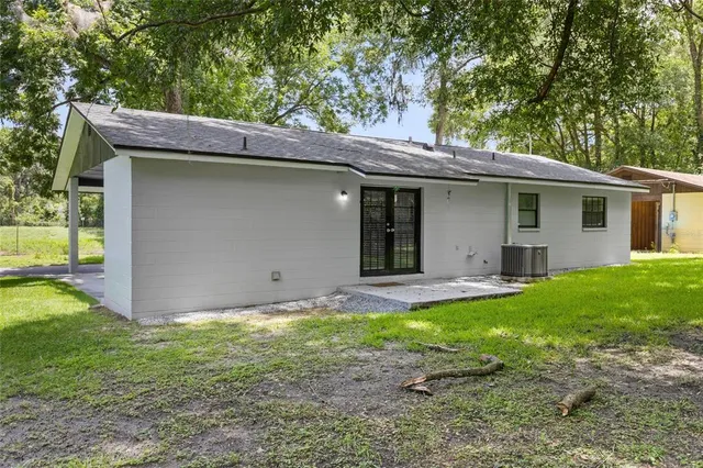 a backyard of a house with lots of green space