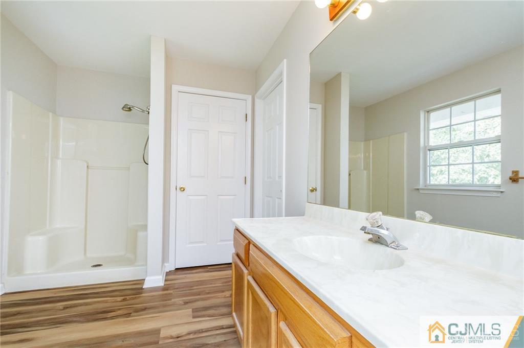 149 Brigantine Road Manahawkin, NJ 08050 - Photo 20 of 29 a bathroom with a sink and a bathtub