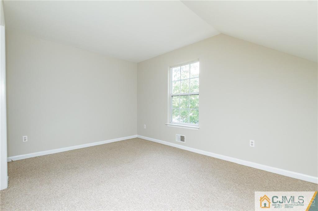 149 Brigantine Road Manahawkin, NJ 08050 - Photo 27 of 29 an empty room with a window