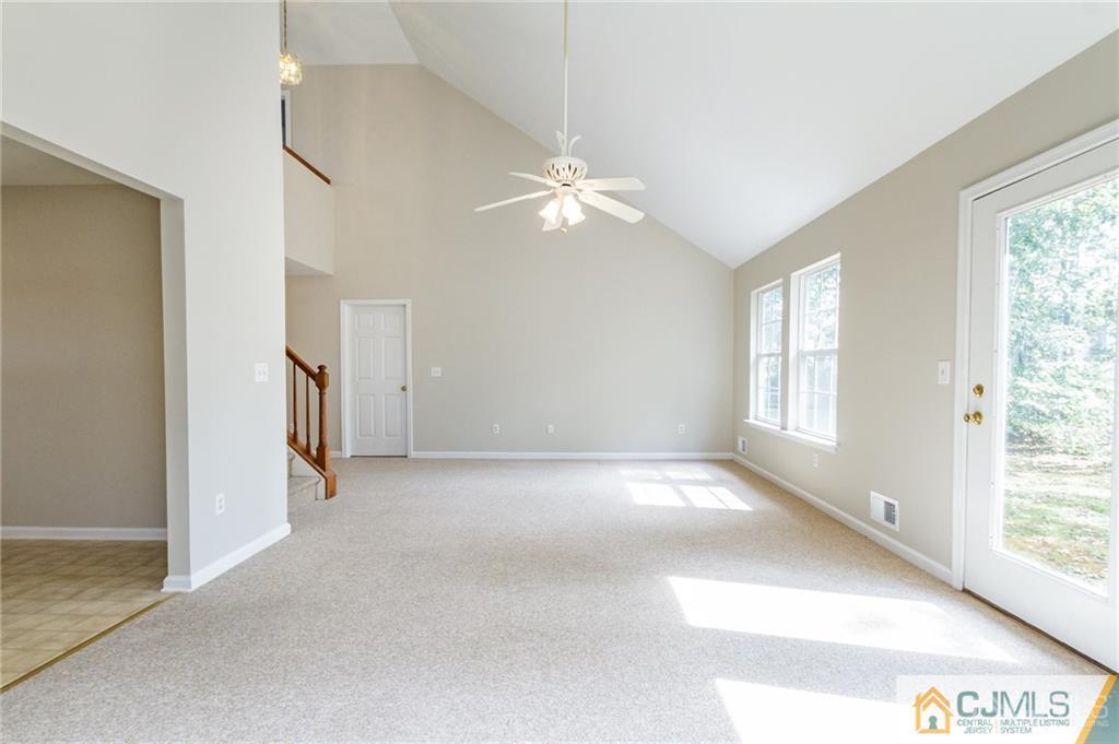 149 Brigantine Road Manahawkin, NJ 08050 - Photo 6 of 29 a view of an empty room with a window