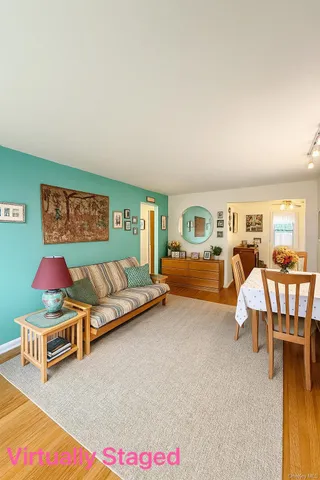 a living room with furniture and a table