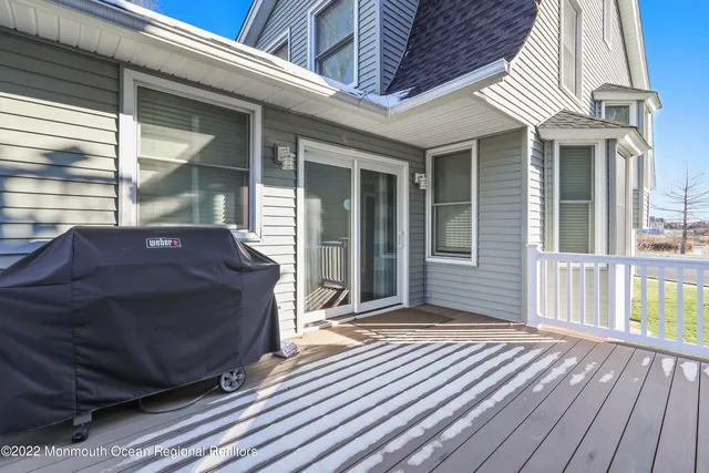 a view of balcony with wooden floor
