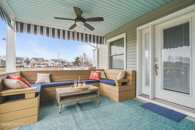 a outdoor space with patio the couches and a dining table with the balcony