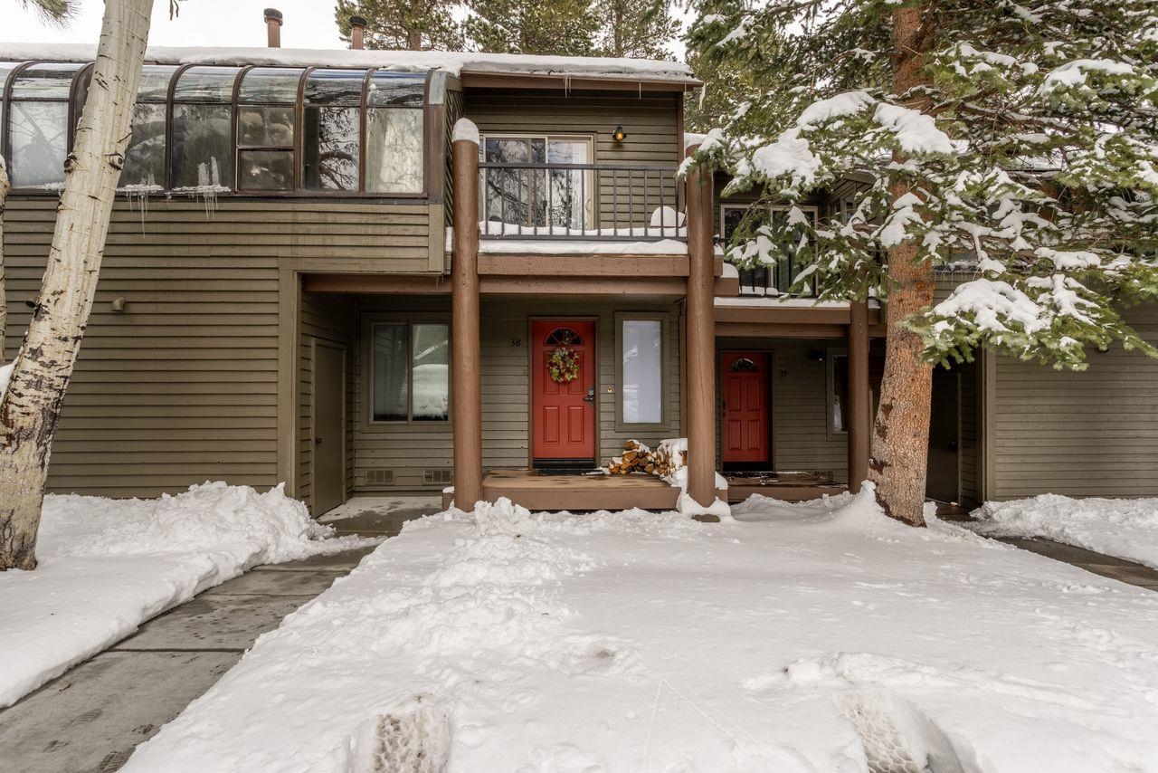 a view of house with outdoor space and porch