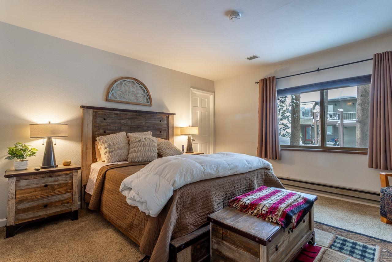 384 Joaquin Road, Unit 38 Mammoth Lakes, CA 93546 - Photo 19 of 30 a bedroom with bed and a window