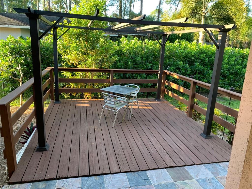 2075 17th Street Southwest Naples, FL 34117 - Photo 3 of 13 a view of outdoor space with seating space
