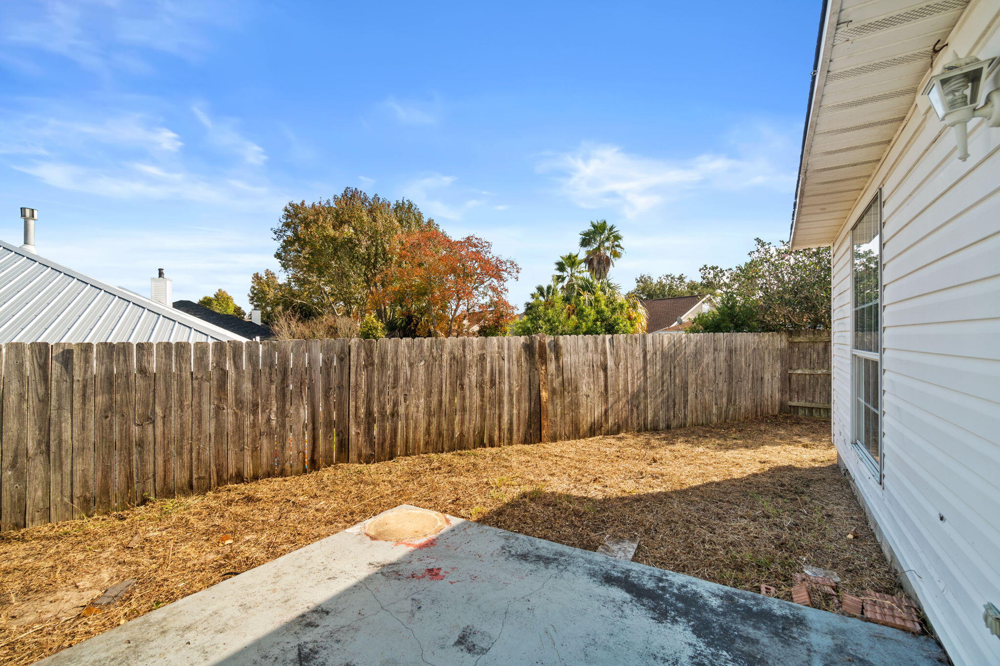 3607 Goldsbys Way Destin, FL 32541 - Photo 24 of 26 a view of backyard with wooden fence
