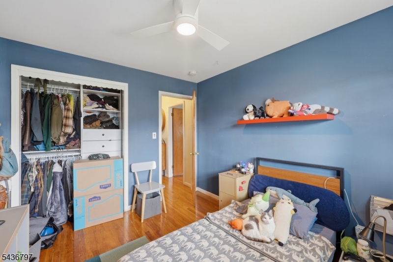 17 Arthur Drive Rutherford, NJ 07070 - Photo 28 of 45 a bedroom with furniture and a window