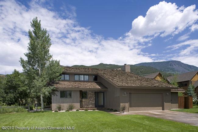 230 Riverside Drive Basalt, CO 81621 - Photo 2 of 12 front view of a house with a garden