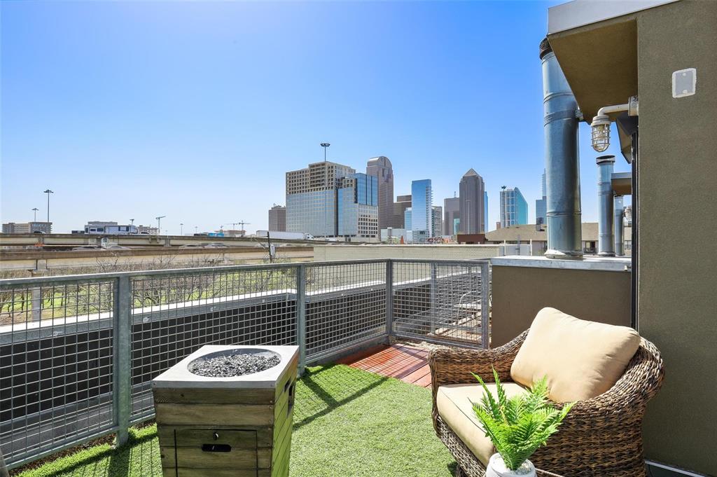 2111 Clark Street, Unit E Dallas, TX 75204 - Photo 1 of 1 a view of a balcony with chairs