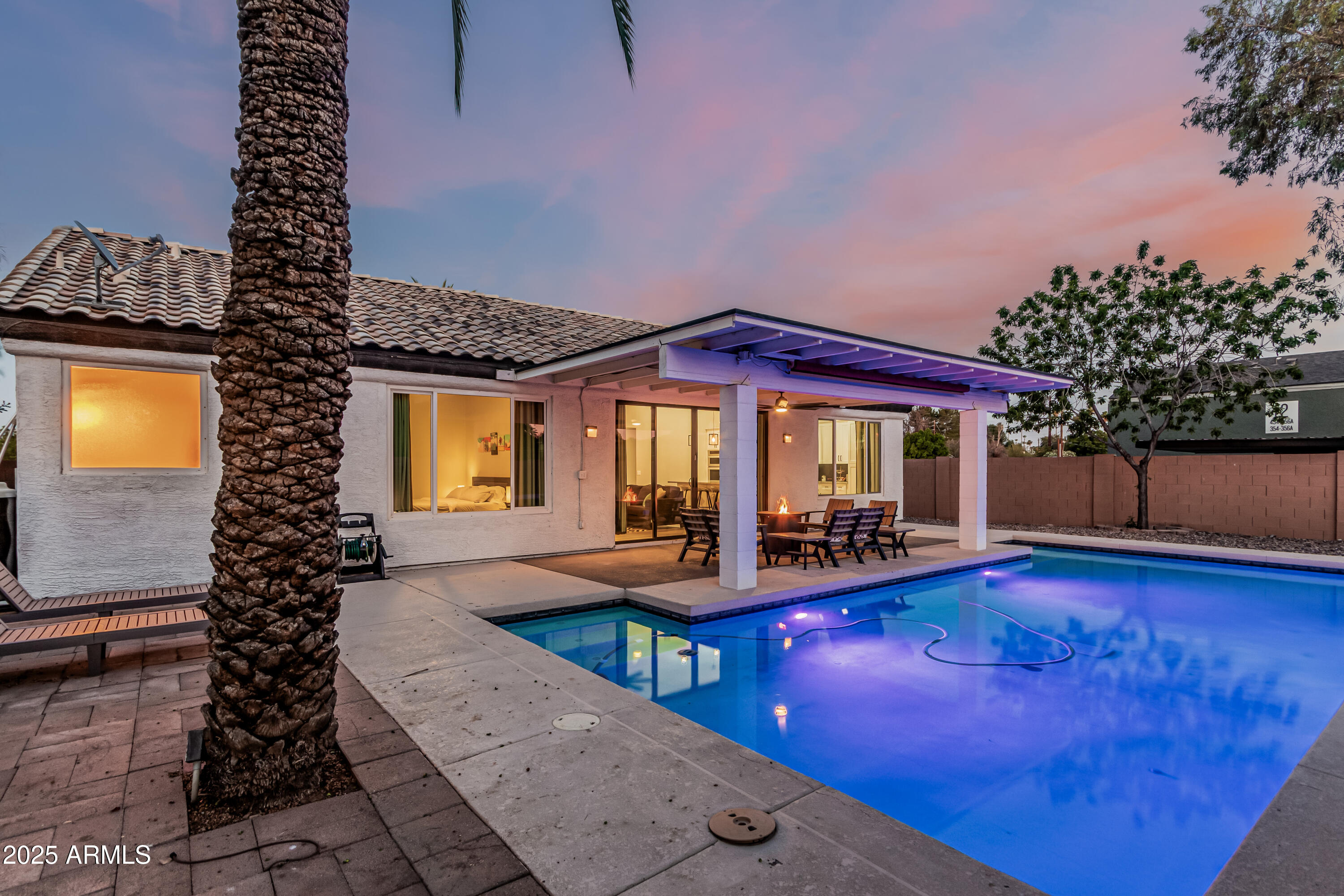 3438 North 30th Street Phoenix, AZ 85016 - Photo 24 of 26 a view of a house with backyard porch and sitting area
