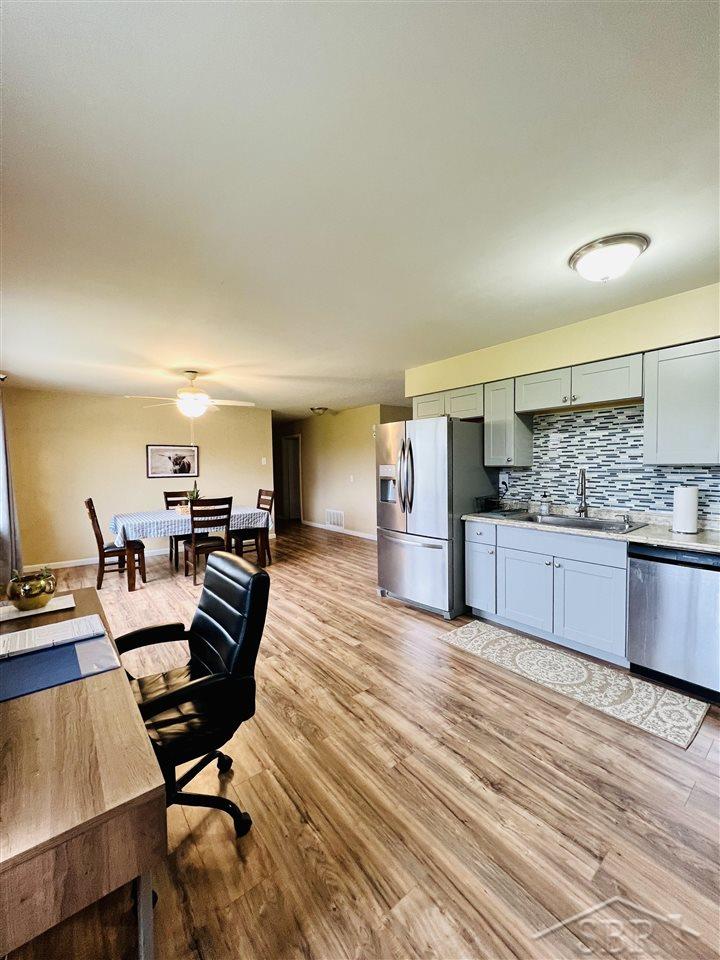 1855 Phelps Lake Road Mayville, MI 48744 - Photo 11 of 31 Open kitchen with area to work from home, or add an island!