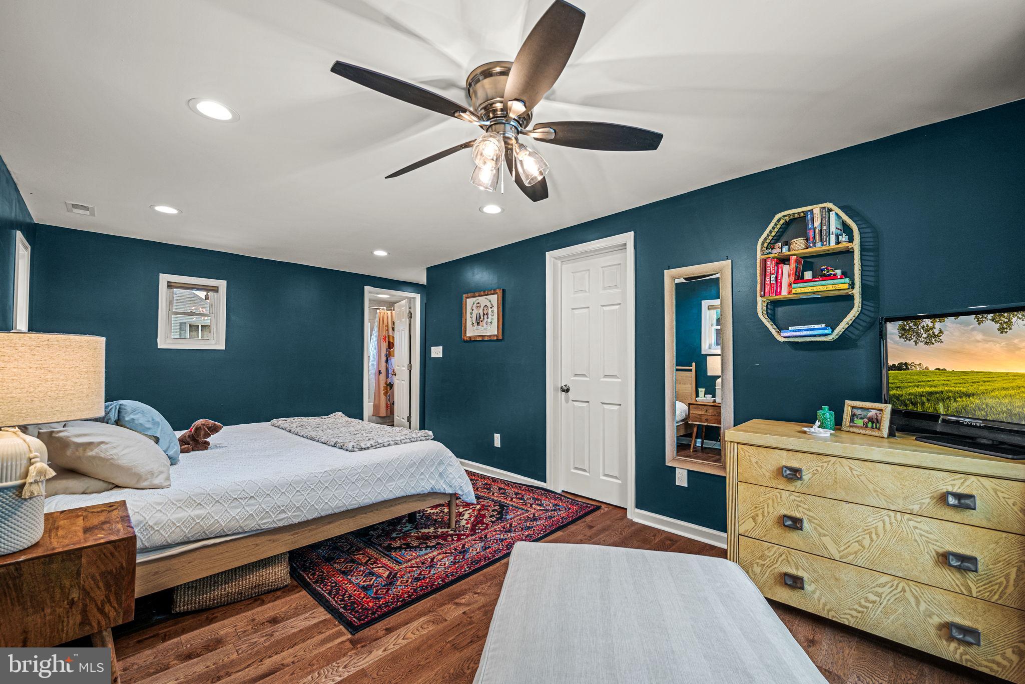 177 Bortondale Road Media, PA 19063 - Photo 22 of 33 a bedroom with a bed and a flat screen tv