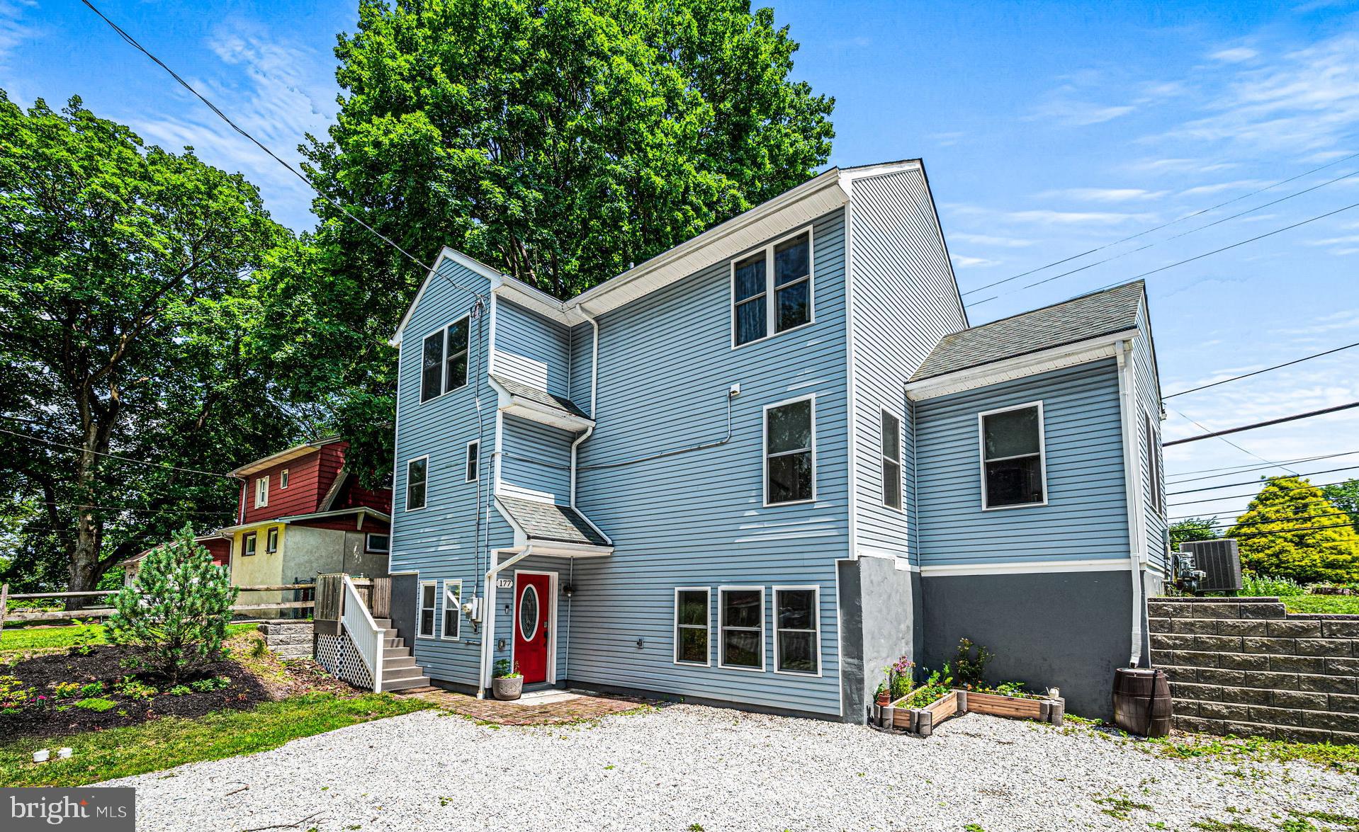 177 Bortondale Road Media, PA 19063 - Photo 3 of 33 a front view of a house with a yard