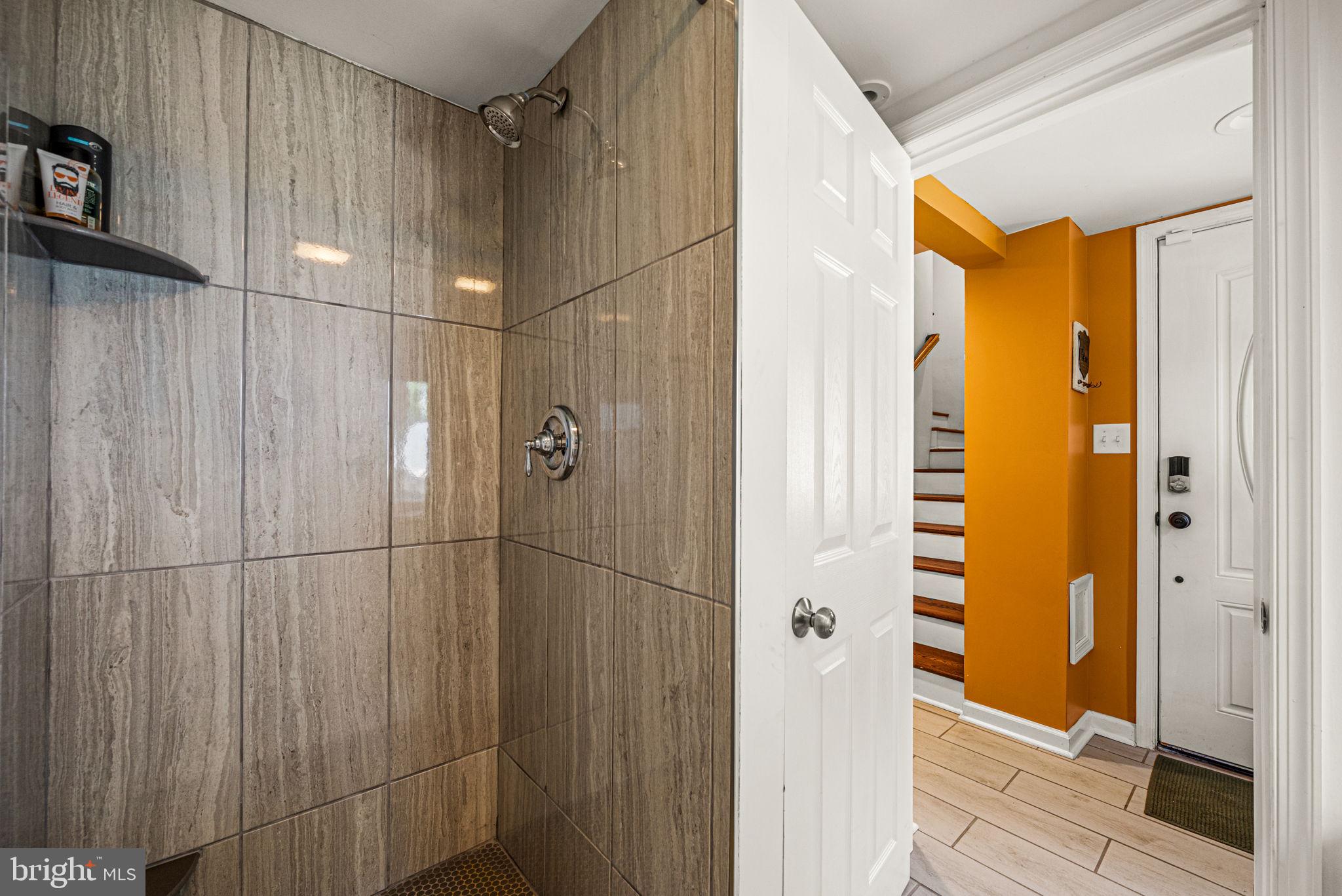 177 Bortondale Road Media, PA 19063 - Photo 7 of 33 a bathroom with a shower and a glass door