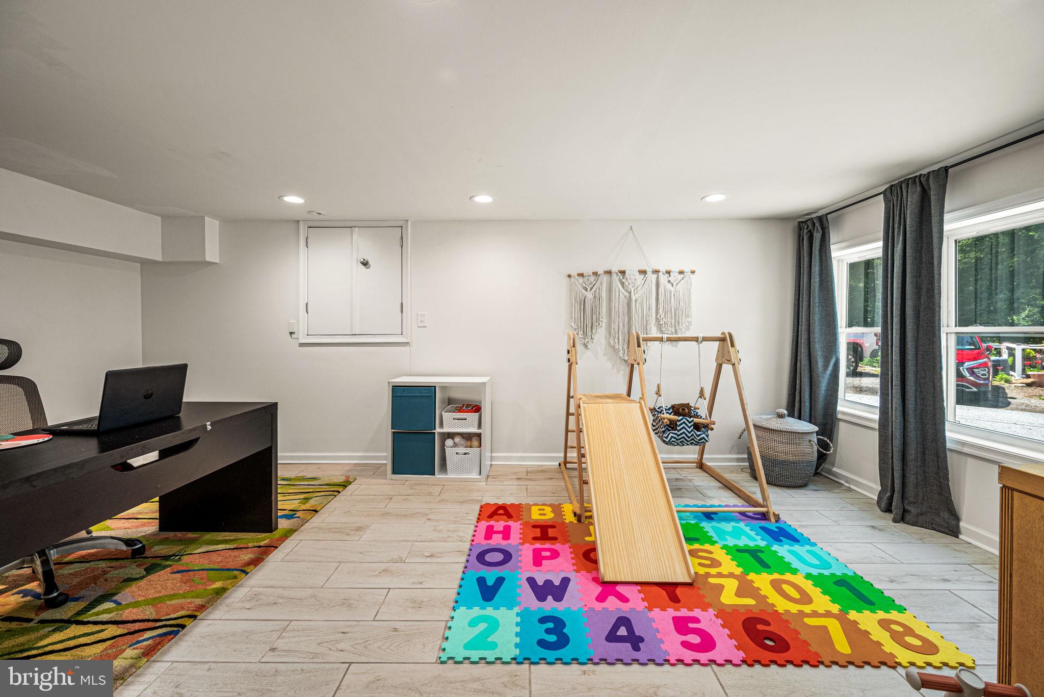 177 Bortondale Road Media, PA 19063 - Photo 9 of 33 a very nice looking room with a large window and white walls